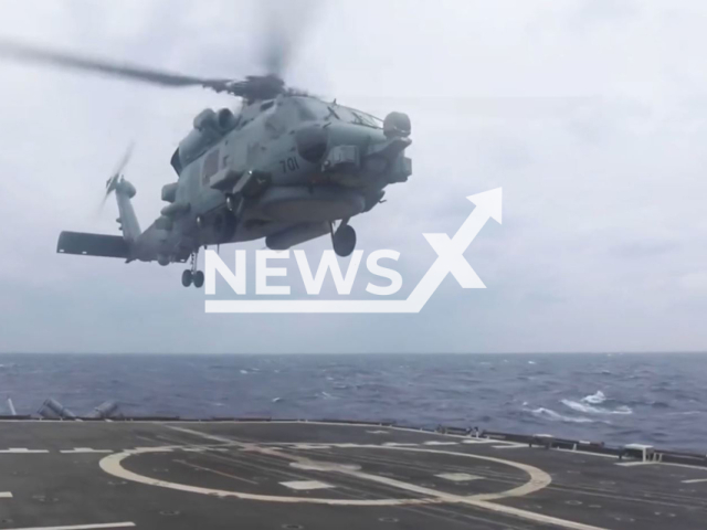 MH-60R Helicopter conducts takeoff aboard USS Chancellorsville in the East China Sea on Moday, Oct. 10, 2022. Note: Picture is screenshot from a video (U.S. Navy/Newsflash)