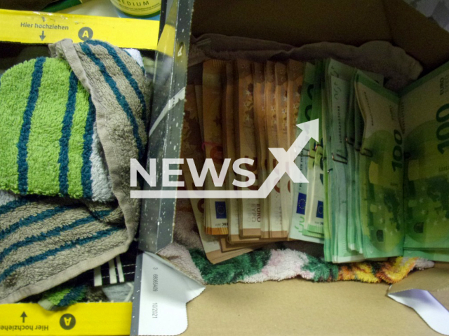 Image shows the cash found in a box addressed to France, undated photo. Officers from the Customs investigation office in Frankfurt am Main, Germany seized about EUR 25,000 (GBP 22,000) in October 2022. Note: Licensed content. (Zollfahndungsamt Frankfurt am Main/Newsflash)