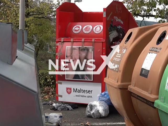 Image shows a clothes container, undated photo. A 26-year-old woman from the town of Weinstadt in Baden-Wurttemberg, Germany died after getting stuck in the container. Note: Photo is a screenshot from a video. (Newsflash)