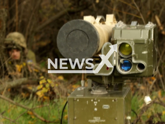 Ukrainian soldier hides in grass behind rocket launcher of Ukrainian Stugna-P in Donetsk region, Ukraine in undated photo. Soldier of anti-tank unit of the 79th separate amphibious assault brigade of Mykolaiv prepared Stugna-P anti-tank missile complex for combat work and destroyed Russian tank. Note: Picture is a screenshot from a video (@www.dshv.mil.gov.ua/Newsflash)