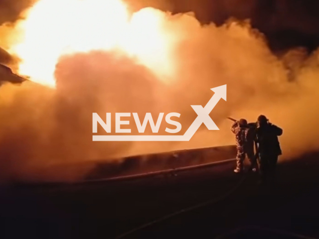 Firefighters battling with fires at oil depots following Russian strikes in the Zhytomyr region in Ukraine on the 7th of March 2022. Note: Picture is a screenshot from a video (@MNSZhytomyr/Newsflash)