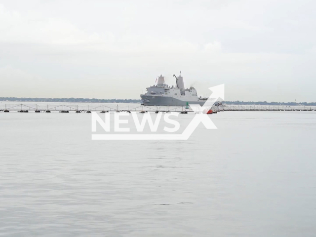 The San Antonio-class amphibious transport dock USS Arlington returns to Naval Station Norfolk after a seven-month deployment on Thursday, Oct. 13, 2022. Note: Picture is screenshot from a video. (U.S. Navy/Newsflash)