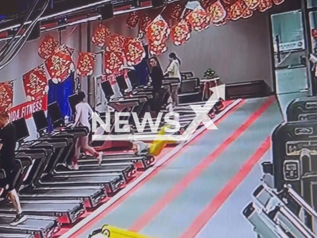 Woman steps on moving treadmill and falls on the floor in Anshan, China. Note: Picture is a screenshot from a video (Lxy12230117/AsiaWire)