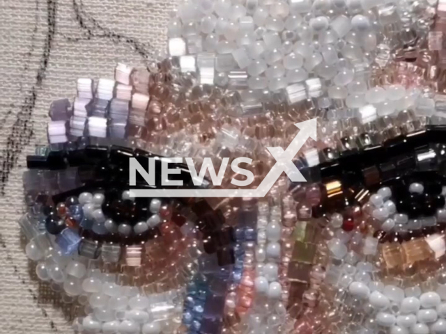 Picture shows a portrait of a young girl made using beads, in undated footage. Embroiderer from Russia, Galissa, uses materials such as beads and old jewelry for her pieces. Note: Picture is a screenshot from a video (@shalfetr/Newsflash)