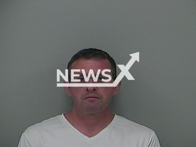 Ex chemistry teacher Justin Robert Foley, 47, poses in undated photo. He reportedly used hidden cameras to record female genitalia in public places in the state of Ohio, USA. Note: Licensed content. (Delaware County Jail/Newsflash)