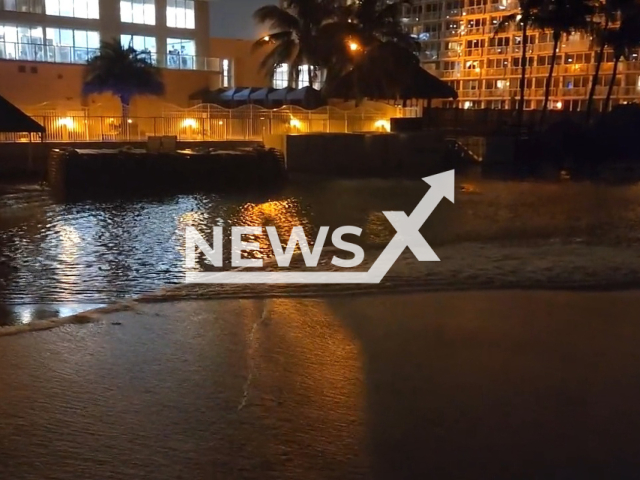 Picture shows waves from Hurricane Nicole in Sunny Isles Beach, Florida around 8:30 PM, on Wednesday, Nov. 9, 2022. David Vergel, 25, has stated that he believes no one was injured by the hurricane in his city. Note: Picture is a screenshot from a video (@DavidVergel97/Newsflash)