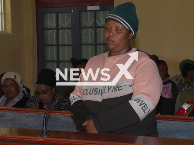 Picture shows Nomboleko Simayile, 32,  in  court , in Ngcobo, South Africa, on Thursday, Nov. 10, 2022. She is accused of killing her four children aged 2 to 11, using a hammer.
Note: Photo is a screenshot from a video. (Newsflash)