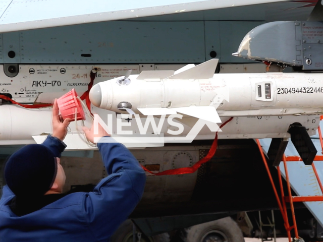 Russian military personnel prepare the missile in the on the fighter jet for a combat mission in Ukraine in undated footage.
According to the Russian Mod during one of the sorties, an aircraft of the Armed Forces of Ukraine was detected and destroyed in a timely manner.
Note: Picture is a screenshot from a video (Ministry of Defense of Russia/Newsflash)