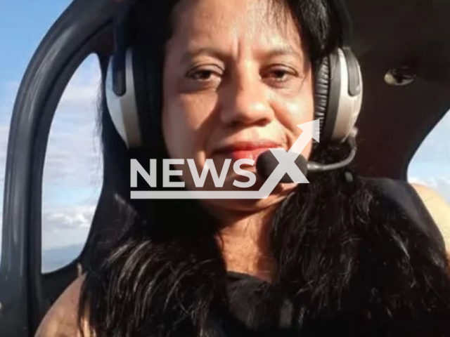 Marcia Pires Santana Alves, 46, poses in undated photo.  She died after being struck by lightning while riding a motorcycle with  her brother-in-law carrying pans  on a highway in Sao Miguel do Araguaia, Brazil, on Tuesday, Nov. 8, 2022.   
Note: Private photo.  (Newsflash)