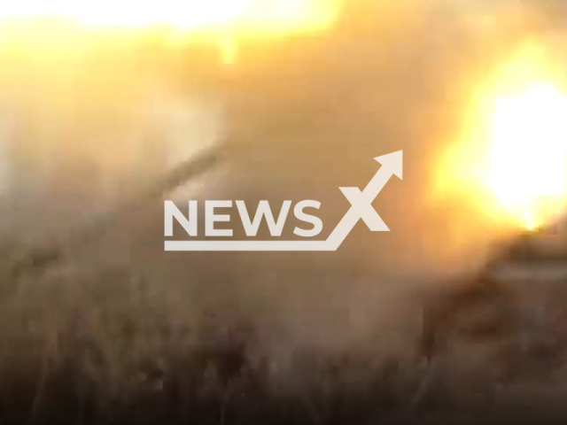 DPR soldier shoots with heavy artillery in Ukraine in undated photo. Artillerymen of the 11th regiment of the People's Militia of the DPR destroyed UAZ-452 vehicle of Ukrainian militants. Note: Picture is a screenshot from a video (@nm_dnr/Newsflash)