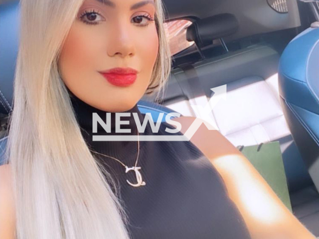 Lawyer Julia Castro, 26, poses in undated photo.  She was attacked  by a hairdresser, neighbours heard the argument and helped her, the hairdresser was arrested  for attempted murder, in Aparecida, Brazil.
Note: Private photo.  (@dra.juliacastroo/Newsflash)