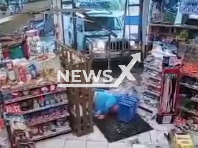 Car smashed through the front doors of a Martin County convenience store and hit a man, who was concerned about his beer. Note: Picture is a screenshot from a video (Martin County Sheriff's Office/Newsflash)