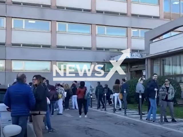 People stand outside building after an earthquake in Ancona, Italy, Wednesday, Nov. 9, 2022.  A woman called his 78-year-old mother, who lives in Ancona, to make sure she was fine after the  earthquake but she did not answer because she had been dead for two months of natural causes.
Note: Photo is a screenshot from a video. (Newsflash)