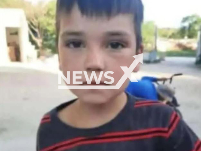 Victor Sebastian Barreto, 8, poses in undated photo. He was looking for food in the dump when was killed by a garbage collection truck, in Parana, Argentina. Note: Private photo.  (Newsflash)