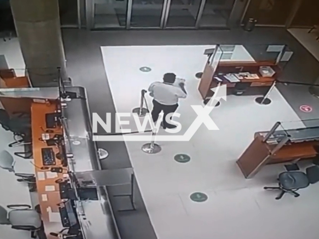 A guard signs in an invisible patient at a hospital, in Buenos Aires, Argentina, on Friday, Nov. 11, 2022. The hospital confiremed taht the video was a joke by one of the security guards. Note: Picture is a screenshot from a video (Newsflash)