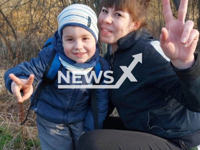 Antonida Vorobieva, 30, poses with her unnamed son, 4,  in undated photo. According to the police investigation, bodies of a man, his wife and a child were found in Osa city, Russia on the afternoon of Thursday, Nov. 10, 2022. Note: Picture is a private photo. (Newsflash)