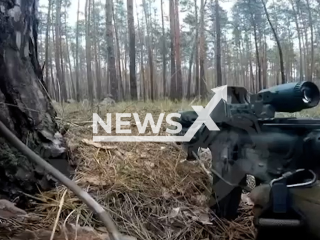 Ukrainian Special Operations Force solider waits for the Russian soldiers in ambush in the forest near Kreminna in the Luhansk region in Ukraine in undated footage.
The footage was released by the Command of the Special Operations Forces of the Armed Forces of Ukraine on Wednesday, Nov. 16. 2022.
Note: Picture is a screenshot from a video (@usofcom/Newsflash)