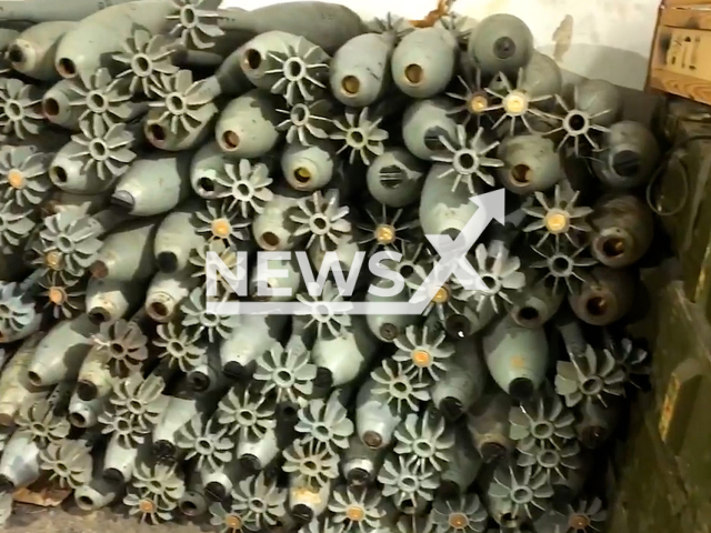 Russian rockets lay near boxes with other military ammunition in Ukraine in undated photo. Ukrainian soldier bragged about captured Russian trophies. Note: Picture is screenshot from a video (@AFUStratCom/Newsflash).