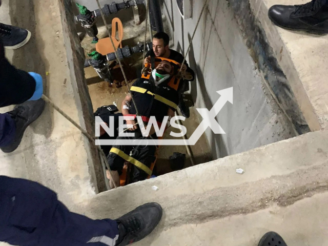 Photo shows a man being rescued by the fire brigade in Tarsus, Mersin, Turkey, Wednesday, Nov. 16, 2022. He tumbled into the basement while talking on the phone. Note: Picture is private (Newsflash)