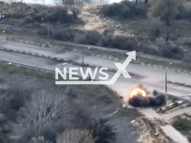 Russian armored personnel carrier explodes at entrance of Oleshky town, Kherson region, Ukraine in undated photo. Artillerymen of the 59th separate motorized infantry brigade named after Yakov Handziuk destroyed Russian vehicle. Note: Picture is screenshot from a video (@59ompbr.com.ua/Newsflash).