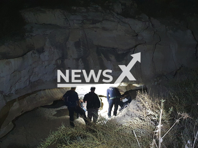 Photo shows the moment when three looters were caught while they were excavating and destroying historical layers in an Ottoman well next to the cemetery of the Bedouin city of Rahat in Negev, Israel, undated photo. The robbers are suspected of searching for a hidden treasure, which, according to a Bedouin myth, was buried in the well, inside a cave. Note: Licensed photo (Emil Aladjem, Israel Antiquity Authority Robbery Prevention Unit/Newsflash)