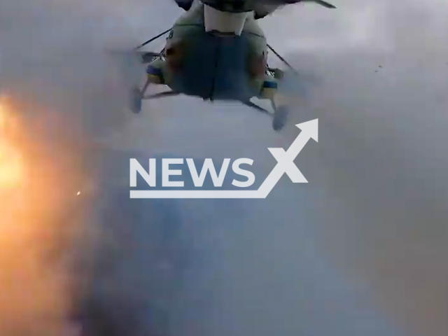 Ukrainian attack helicopter launches rockets in sky in Ukraine in undated photo. The helicopter went on its combat mission and shot rockets to its targets. Note: Picture is screenshot from a video (@UkrainianLandForces/Newsflash).