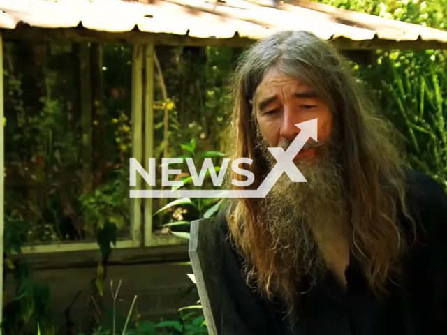 Image shows Friedmunt Sonnemann, 56, undated photo. He has spent the last 32 years of his life living in a forest in the municipality of Longkamp, in the Bernkastel-Wittlich district in Rhineland-Palatinate, Germany. Note: This photo is a screenshot from a video. (Newsflash)