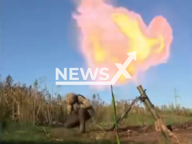 Ukrainian soldiers from the  109th Separate Mountain Assault Battalion load a mortar with shells and fire at Russian positions in undated footage. The 10th Separate Mountain Assault Brigade is a military unit of the Ground Forces of the Armed Forces of Ukraine, based in the city of Kolomyia. Note: Picture is screenshot from a video. (@109OGSHB/Newsflash)