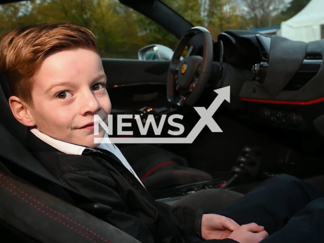 Image shows eight-year-old Gianluca, undated photo. Lottery winner Kursat Yildirim, aged 42, took the boy for a ride in his Ferrari in the city of Dortmund, Germany. Note: Photo is a screenshot from a video. (Newsflash)