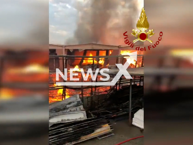 Factory burning in  Villastellone, Italy, undated. About twenty teams were involved in the extinguishing operations.Note: Picture is screenshot from a video (@vigilidelfuoco/Newsflash)