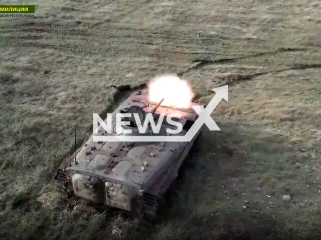 Pro-Russian tank shoots in a field area during combat training  in Ukraine in undated photo. LPR tank crews carry out intense armed forces training with BMP-1 infantry fighting vehicles. Note: Photo is a screenshot from a video(@millnr/Newsflash).