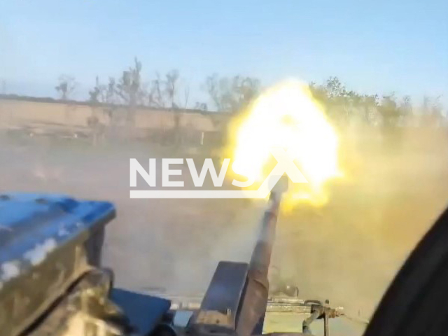 Ukrainian tank shoots in a field area in Ukraine in undated photo. Ukrainian tank crews of the 28th separate mechanized brigade named after the Knights of the Winter Campaign launched attack to protect Kherson region from Russian invaders. Note: Picture is a screenshot from a video (@28brigade/Newsflash)