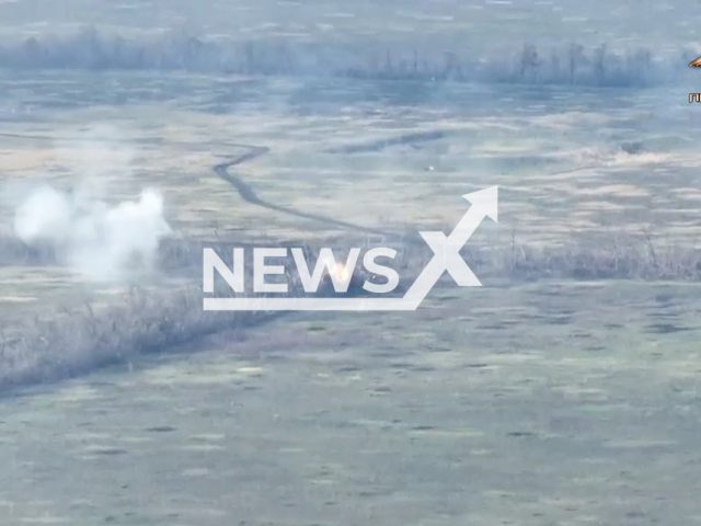 Picture shows an explosion in a treeline near Nevelske, Donetsk region, Ukraine in undated photo. Soldiers of the 100th Guards brigade of the People's Militia of the DPR detected Ukrainian army positions with the help of aerial reconnaissance and fired them. Note: Picture is a screenshot from a video (@nm_dnr/Newsflash)