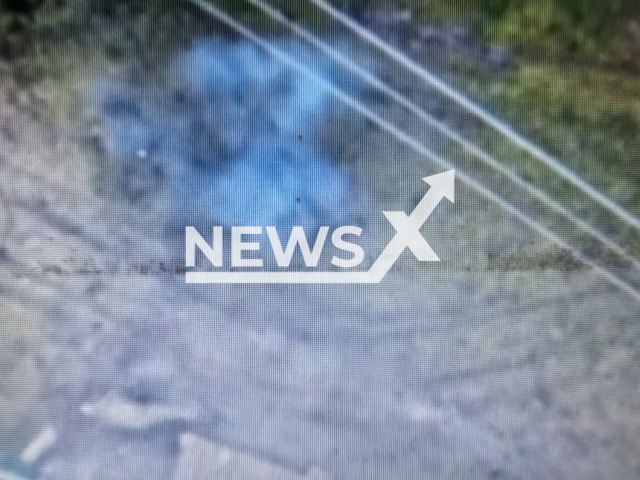 Picture shows an explosion near running Russian invaders in a field area in Ukraine. The footage was obtained from the 14th separate mechanized brigade of the Armed Forces of Ukraine on Wednesday, Nov. 23, 2022. Note: Photo is screenshot from a video (@14ombr/Newsflash).