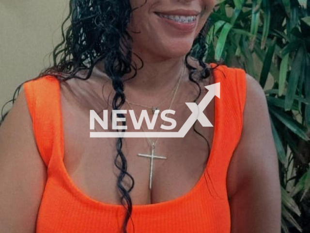 Eva Cristina Dias, 36, poses in an undated photo. She died after accidentally shooting herself in the head while taking a photo in Araras, Brazil Monday, Nov. 21, 2022. Note: Picture is private (Cris Dias/Newsflash)