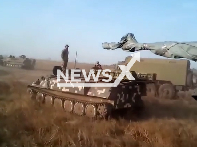 Picture shows Ukrainian solders on the tanks and military vehicles on the way to liberate the occupied Ukrainian territories in Ukraine in undated footage.
The footage released by the Office of Strategic Communications on Tuesday, Nov. 29, 2022. Note: Photo is a screenshot from a video. (@AFUStratCom/Newsflash).