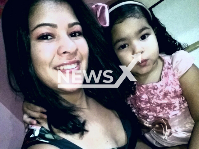 Daniela Barbosa Caires, 24, and her daughter Jhulya Sophia Barbosa Santos, 6, pose in undated photo.  They died when a truck loaded with cement crashed into thir  house in Ituacu, Brazil, on Sunday, Nov. 27, 2022. 
Note: Private photo.  (Newsflash)