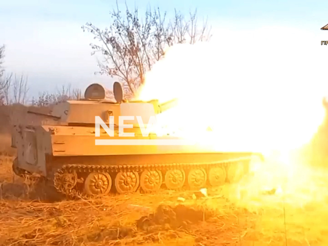 DPR tank shoots in Pivnichne, Donetsk region, Ukraine in undated photo. Artillerymen of the 3rd brigade of the People's Militia of the DPR destroyed Ukrainian observation point. Note: Picture is screenshot from a video (@nm_dnr/Newsflash).