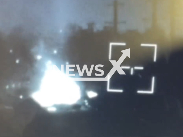 Picture shows explosion after the fighters from the 79th separate amphibious assault brigade hit the Russian tank in the Donbas region in Ukraine in undated footage. The footage was released by the brigade on Wednesday, Nov. 30, 2022. Note: This picture is a screenshot from the video. (@79AMBUA/Newsflash)