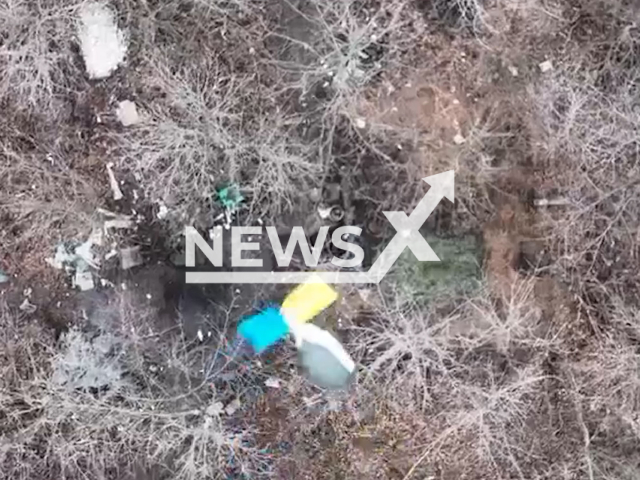 Bomb falls on Russian soldiers hiding in their foxholes in Bakhmut, Donetsk region, Ukraine. The footage was obtained from the 30th separate mechanized brigade of the Ukrainian Ground Forces on Wednesday, Nov. 30, 2022. Note: Picture is screenshot from a video (@30brigade/Newsflash).