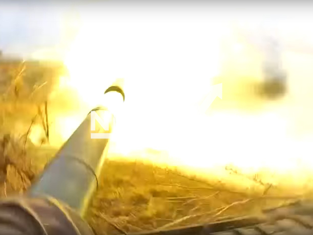 DPR T-80 tank shoots in Vodyane, Zaporizhzhia region, Ukraine. The footage was obtained from the People's Militia of the DPR on Thursday, Dec. 1, 2022. Note: Picture is screenshot from a video (@nm_dnr/Newsflash).