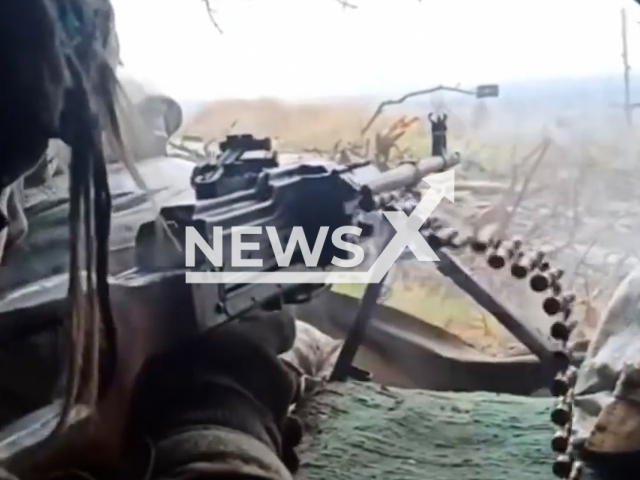 Ukrainian soldier shoots machine gun from a dugout in Ukraine. The footage was obtained from the Armed Forces of Ukraine on Friday, Dec. 2, 2022.  Note: Picture is screenshot from a video (@AFUkraine/Newsflash).