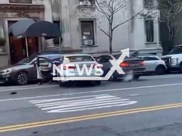 Man rams into two parked vehicles in New York City, USA, on Monday, Nov. 21, 2022. According to Xavier Velazquez the man in grey sweats was arrested. Note: Picture is a screenshot from a video (@cchowd3r/Newsflash)