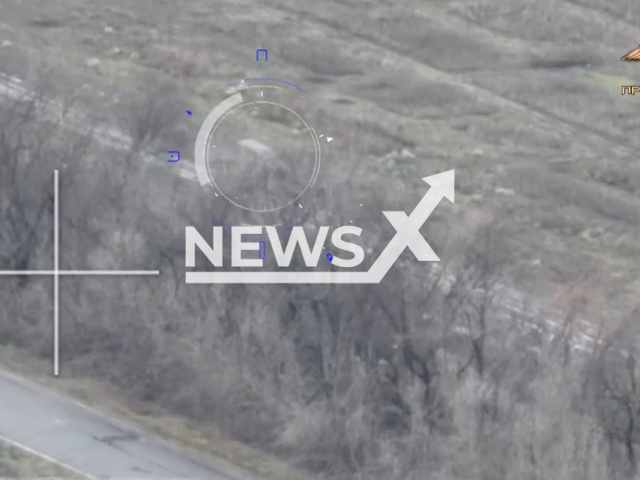 Ukrainian vehicle moves down the road in Ukraine. The footage was obtained from the People's Militia of the DPR on Friday, Dec. 2, 2022. Note: Picture is a screenshot from a video (@nm_dnr/Newsflash)