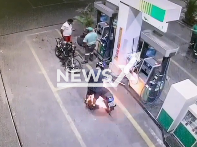 A motorcycle catches fire at a petrol station in Corumba, Mato Grosso do Sul, Brazil, Tuesday, Nov. 29, 2022. The petrol station staff acted quickly and managed to put out the flames before it spread. Note: Picture is a screenshot from a video (Newsflash)