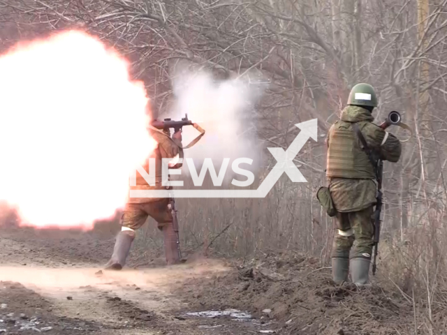 Russian mobilized soldiers conduct assault exercise in urban areas in the occupied parts of Ukraine in undated footage.
The footage was released by the Russian MoD on Tuesday, Dec. 6, 2022. Note: This picture is a screenshot from the video. (Ministry of Defense of Russia/Newsflash)