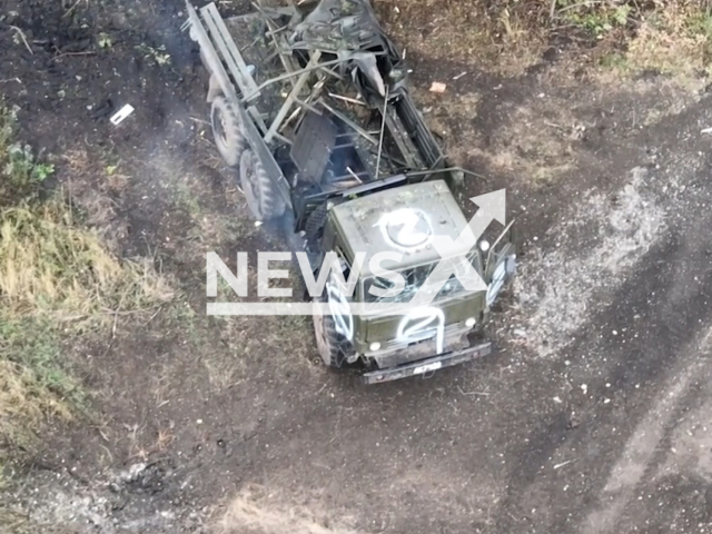 Picture shows damaged Z Russian military truck with ammunition in a residential area in Donetsk region, Ukraine. The footage was obtained from the K2 combat group of the 54th separate mechanized brigade on Tuesday, Dec. 6, 2022. Note: Picture is a screenshot from a video (@K2.54OMBr/Newsflash)