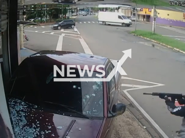 A man in a truck is shoot  by a masked man with a rifle in Rio Claro, Brazil on Tuesday Dec. 6, 2022.  
Sergio Eduardo Aparecido Fazio da Costa, 43,  was executed after the truck crashed, and the suspects fleed, the investigation is ongoing.  by Note: Picture is screenshot from a video (Newsflash).