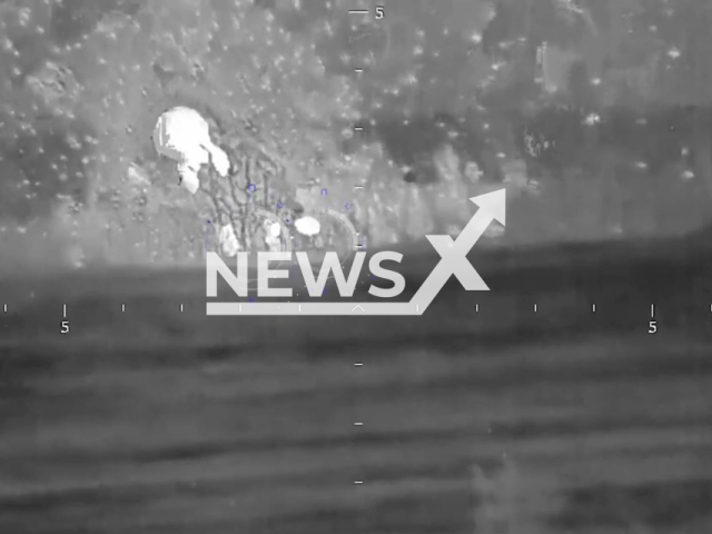 Picture shows an explosion of Ukrainian infantry fighting vehicle and a pickup truck in Ukraine. The footage was obtained from the People's Militia of the DPR on Wednesday, Dec. 7, 2022. Note: Picture is screenshot from a video (@nm_dnr/Newsflash).