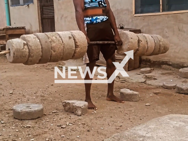 Azeez Yusuf Oriyomi, from Nigeria, deadlifts with homemade equipment in undated footage. Azeez crafted his equipment himself using cement, sand, and other materials. Note: Picture is a screenshot from a video (@theoutworker11 Azeez Yusuf Oriyomi/Newsflash)